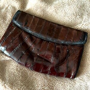 Gorgeous vintage supple leather clutch with interior suede. Beautiful and unique